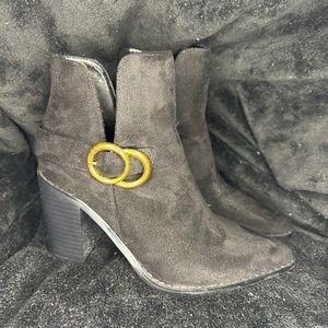 Black boots with gold buckle detail. Worn twice